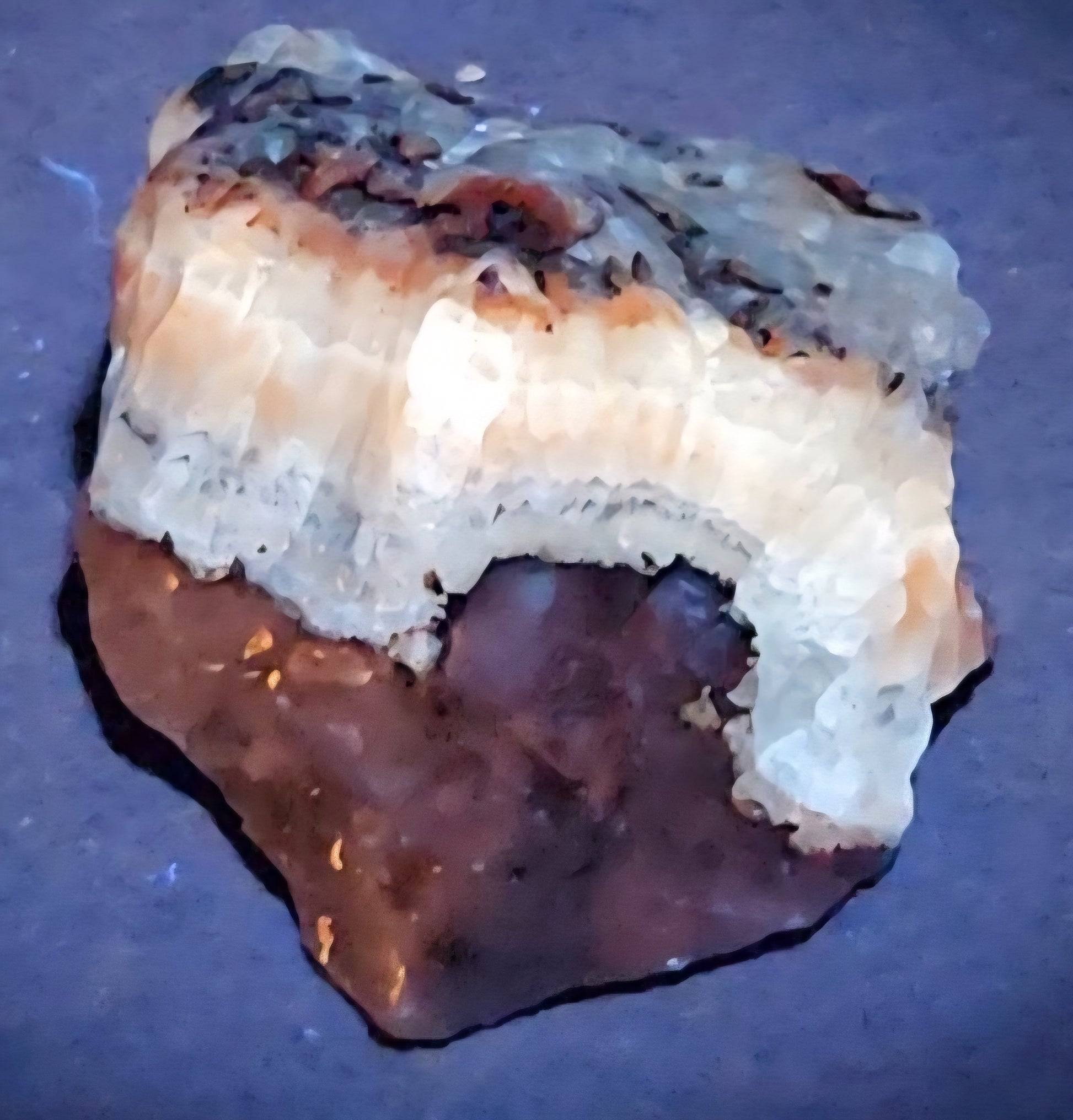 Tri-color calcite rough rock specimen with UV reactive properties