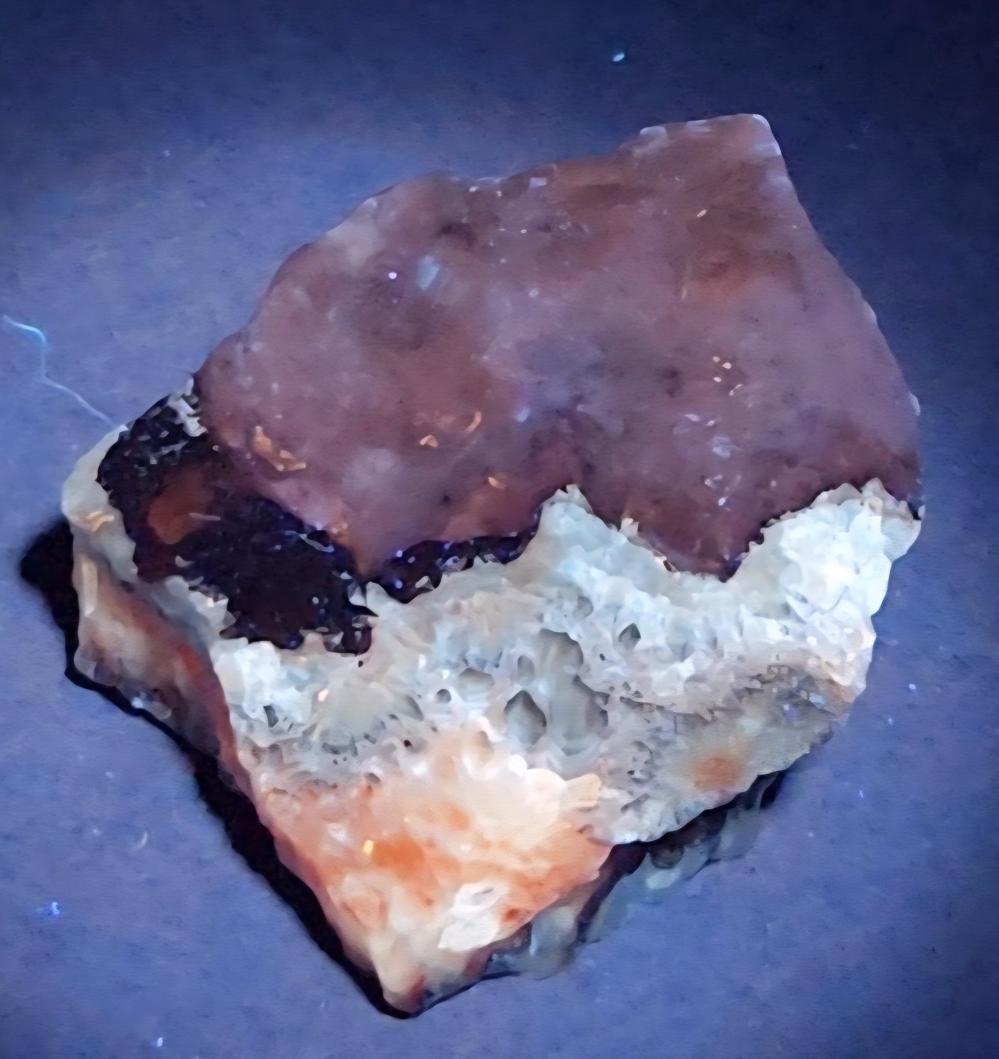 Tri-color calcite rough rock specimen with UV reactive properties
