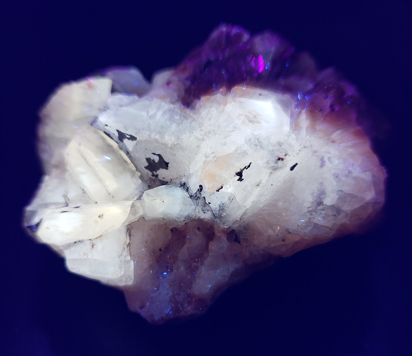 Tri-color calcite rough rock with UV reactive properties