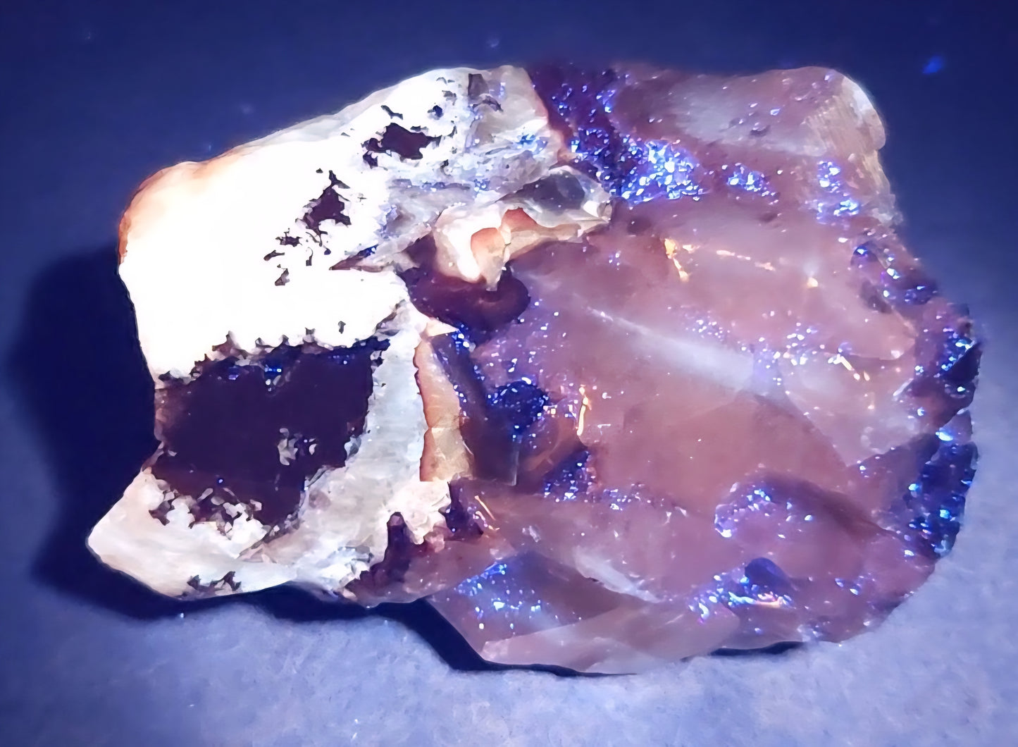 Tri-color calcite rough rock with UV reactive features
