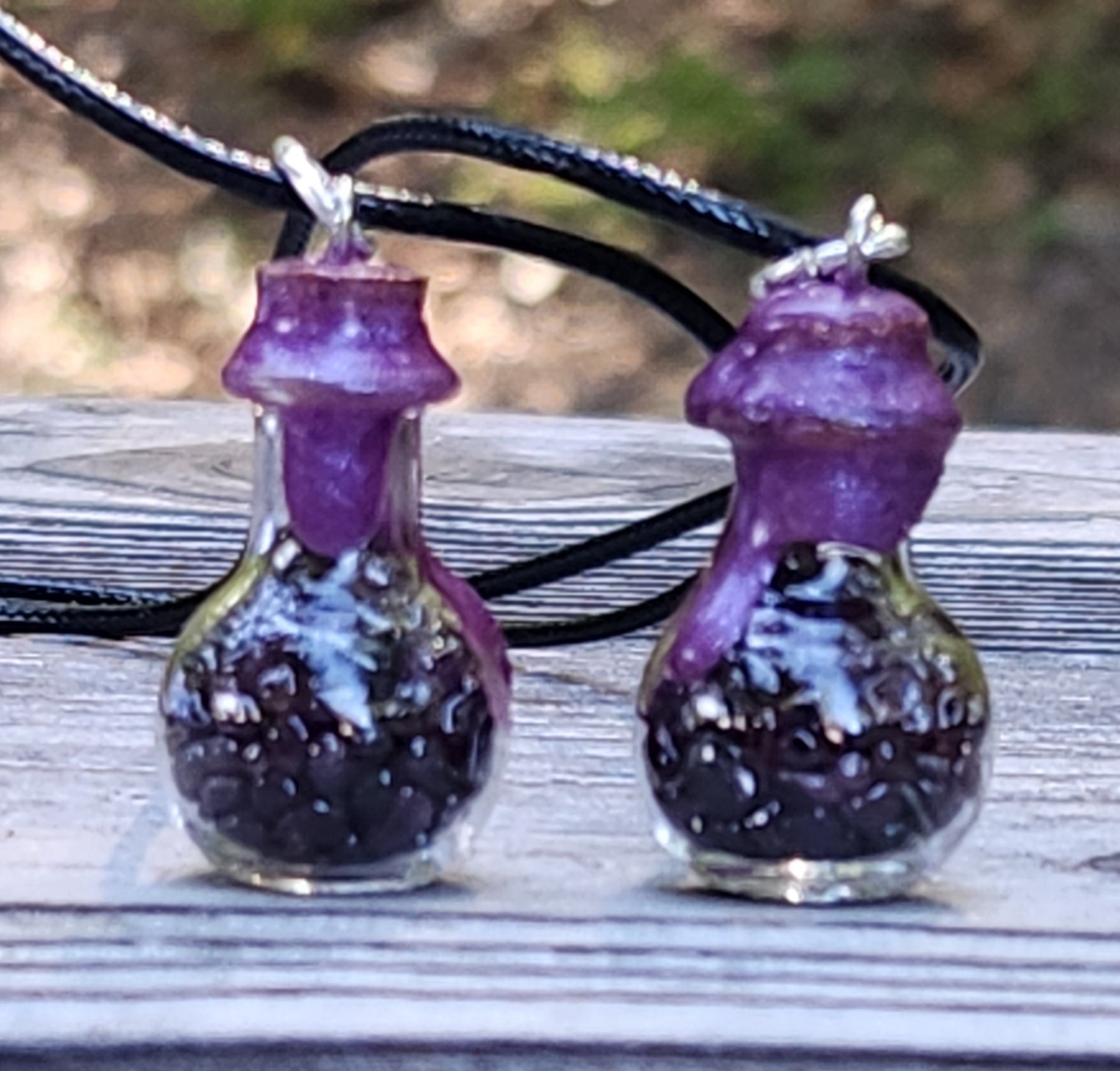 Tumbled garnet gemstone necklace in glass bottle pendant bulb shape