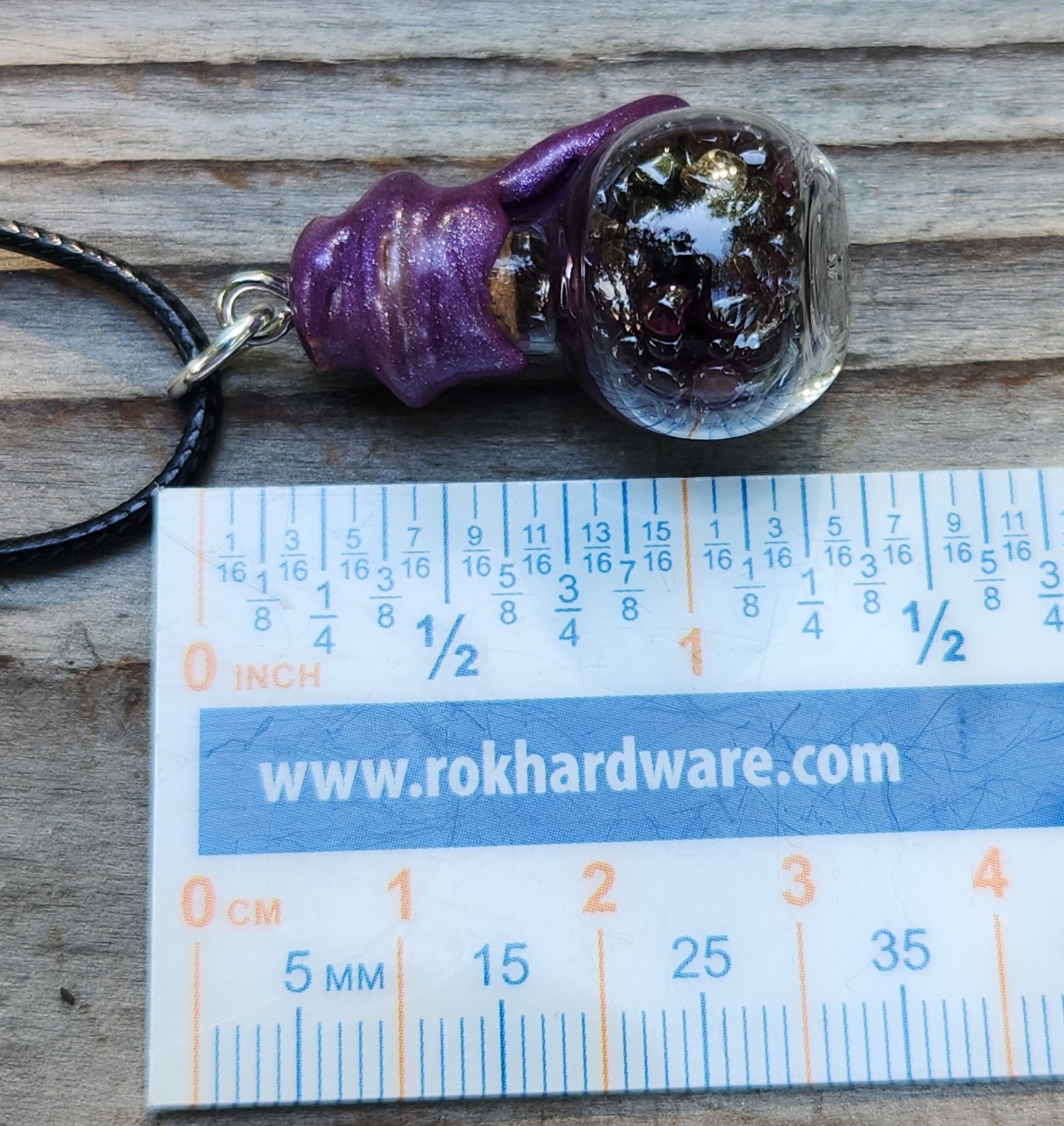 Tumbled garnet gemstone necklace in glass bottle pendant ruler