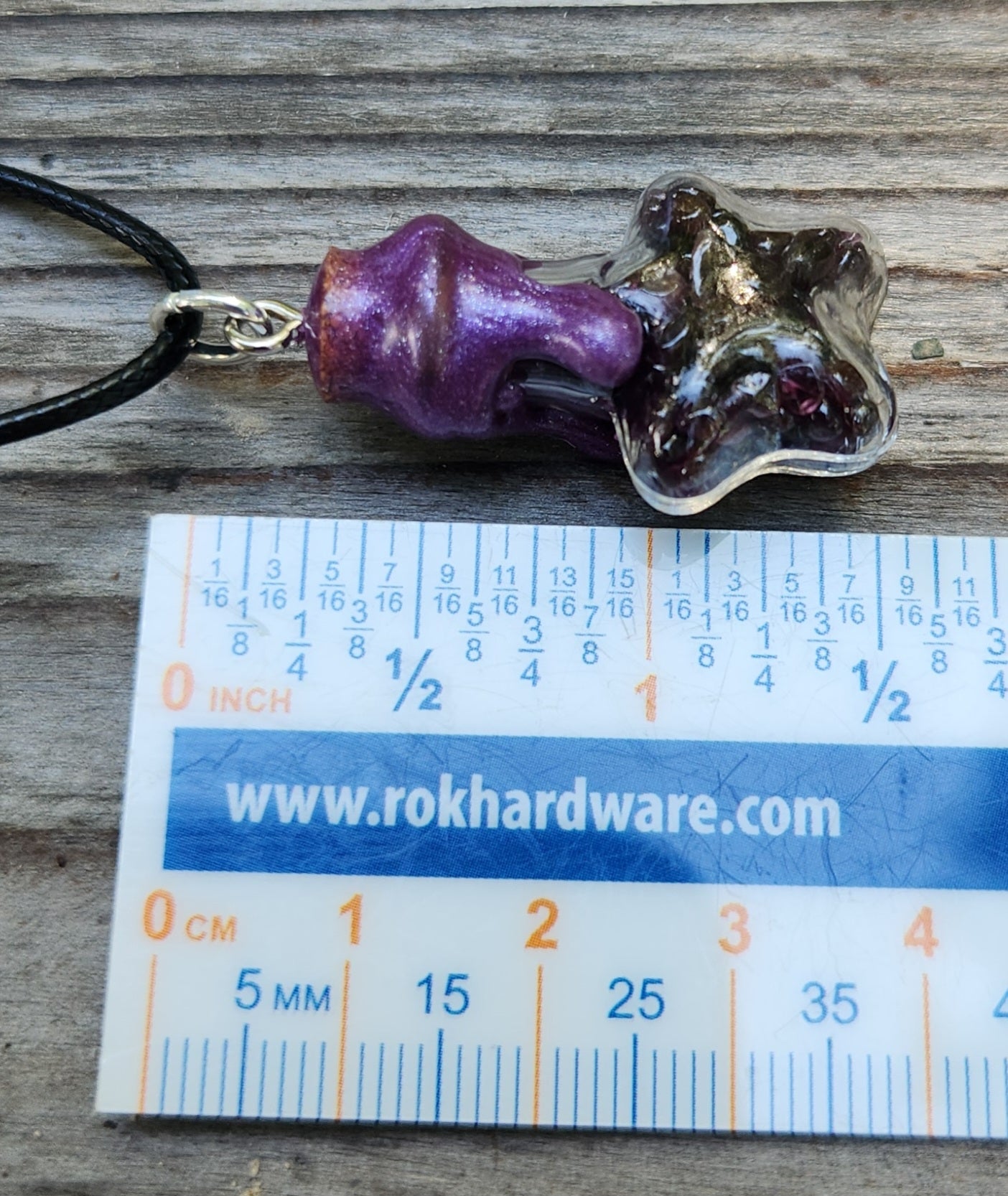 Tumbled garnet gemstone necklace in glass bottle pendant ruler