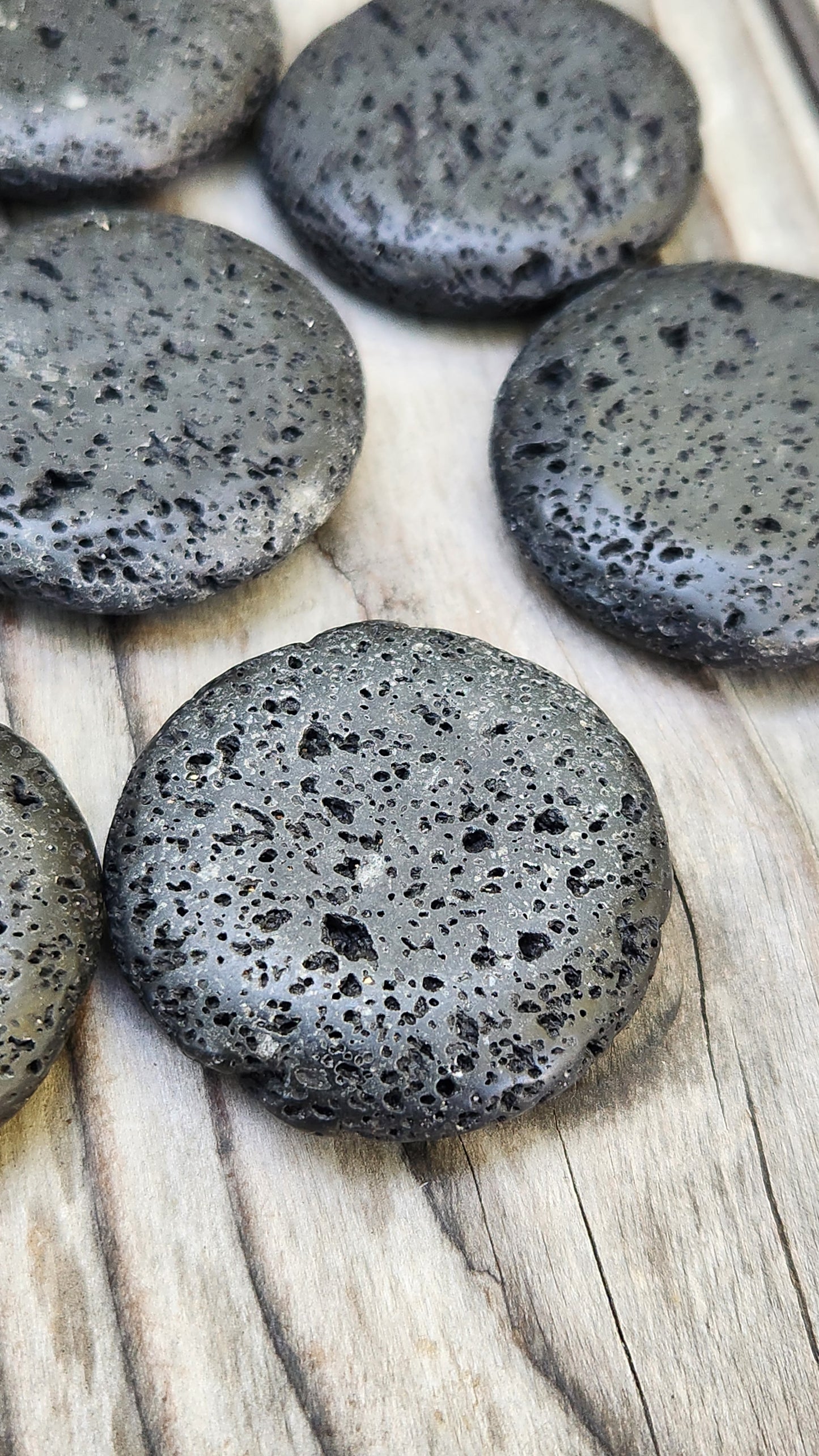 Natural lava rock palm stone with volcanic texture close up